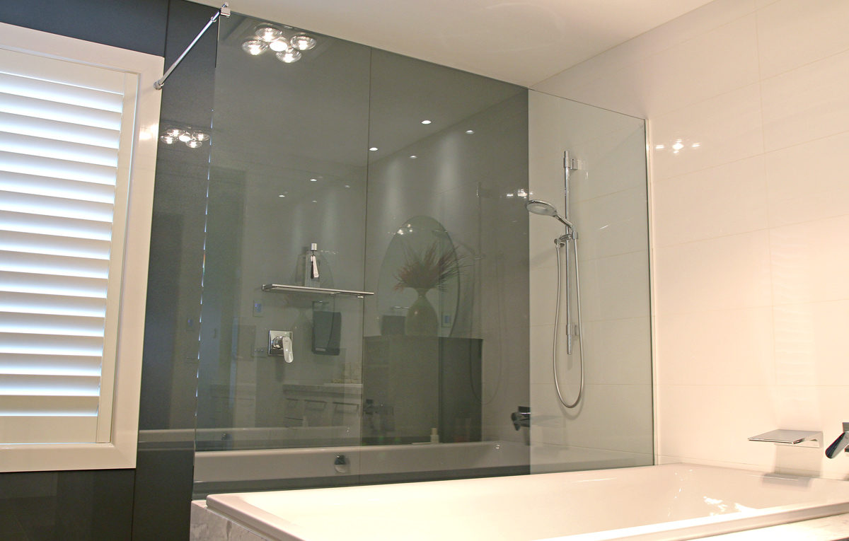 Framless glass shower screen.