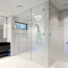 Frame less double door shower screen with 3 hinged doors.