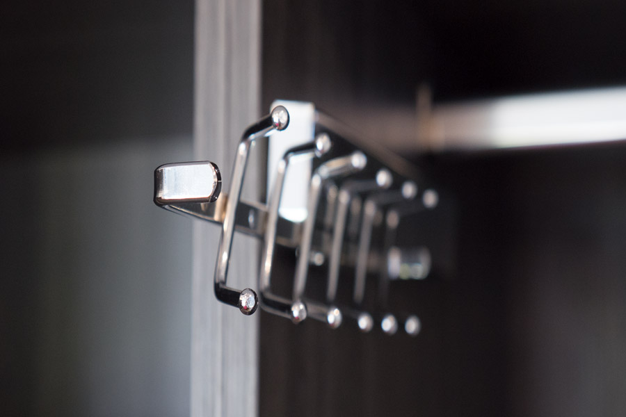 Silver tie rack.